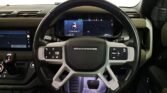 black landrover defender, 2020 diesel s variant. interior seats grey and black and steering wheel